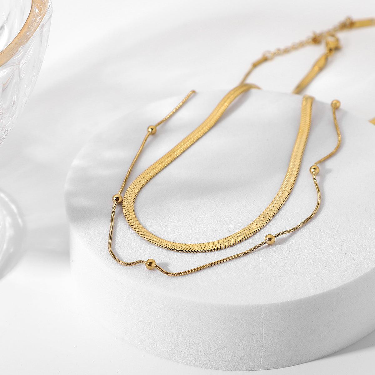 2 इन 1 लेयर्ड स्नेक और बीड नेकलेस सेट