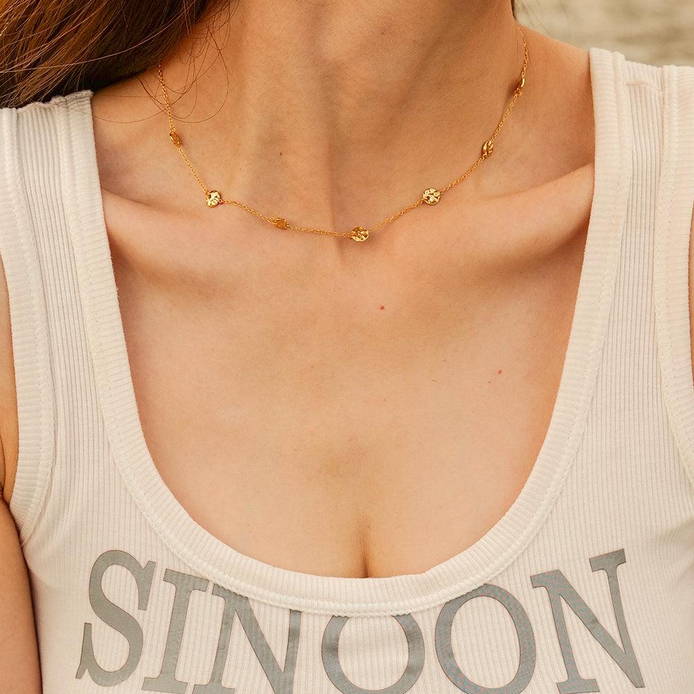 डिस्क टैसल नेकलेस