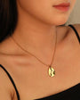 Buy gold-toned necklace with a hammered