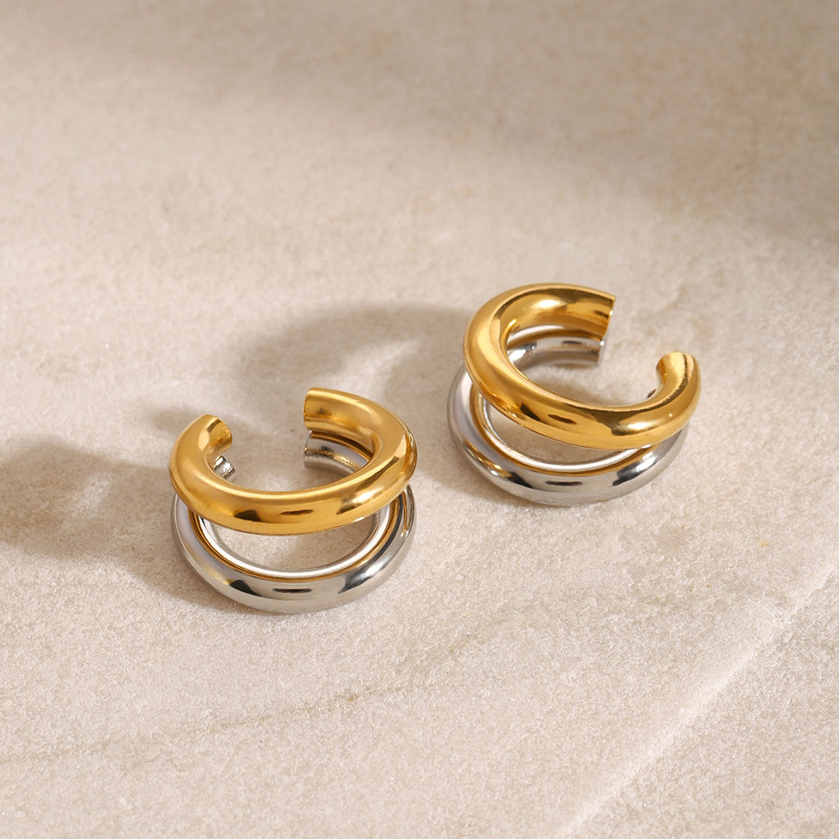 Buy Pair of gold and silver hoop earrings